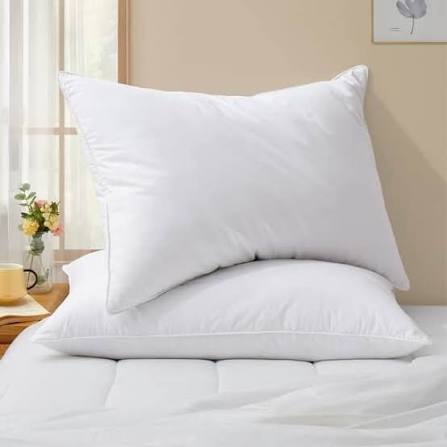 Bed And White Pillow And Bed Sheets